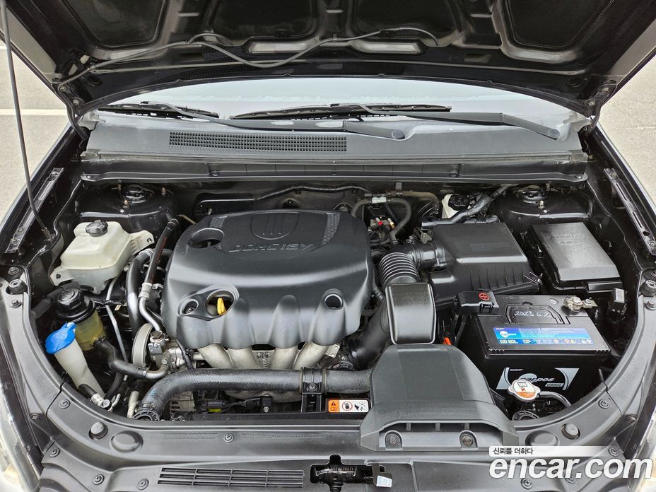 Kia Carens 2nd Gen фото 18