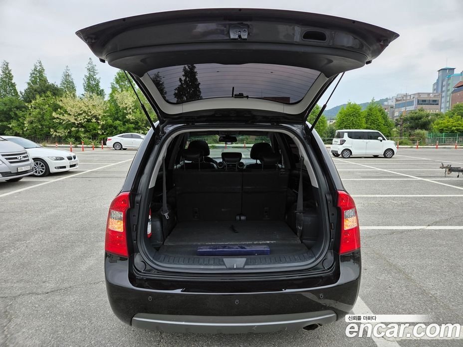 Kia Carens 2nd Gen фото 19