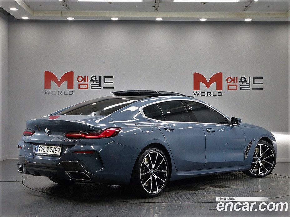 BMW 8-Series (G15) фото 3