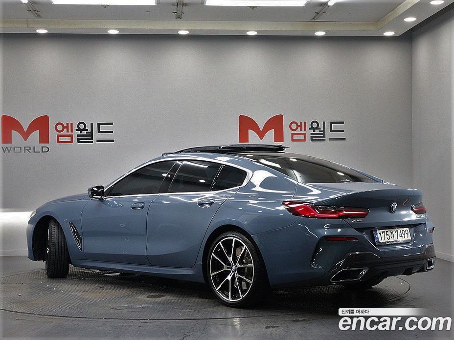 BMW 8-Series (G15) фото 4