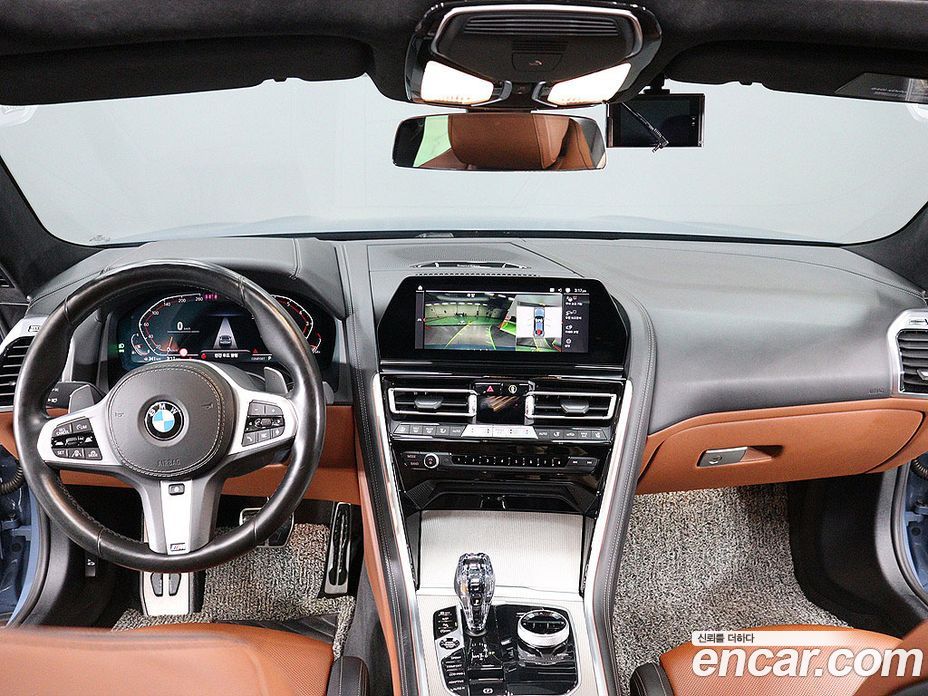 BMW 8-Series (G15) фото 7
