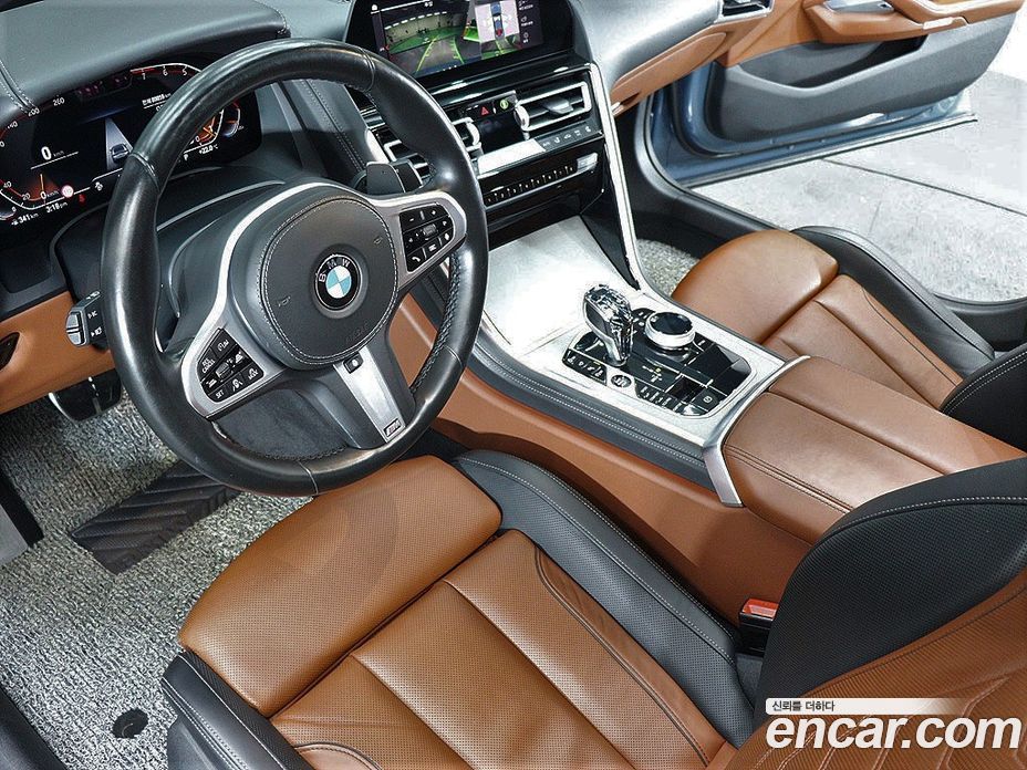 BMW 8-Series (G15) фото 10
