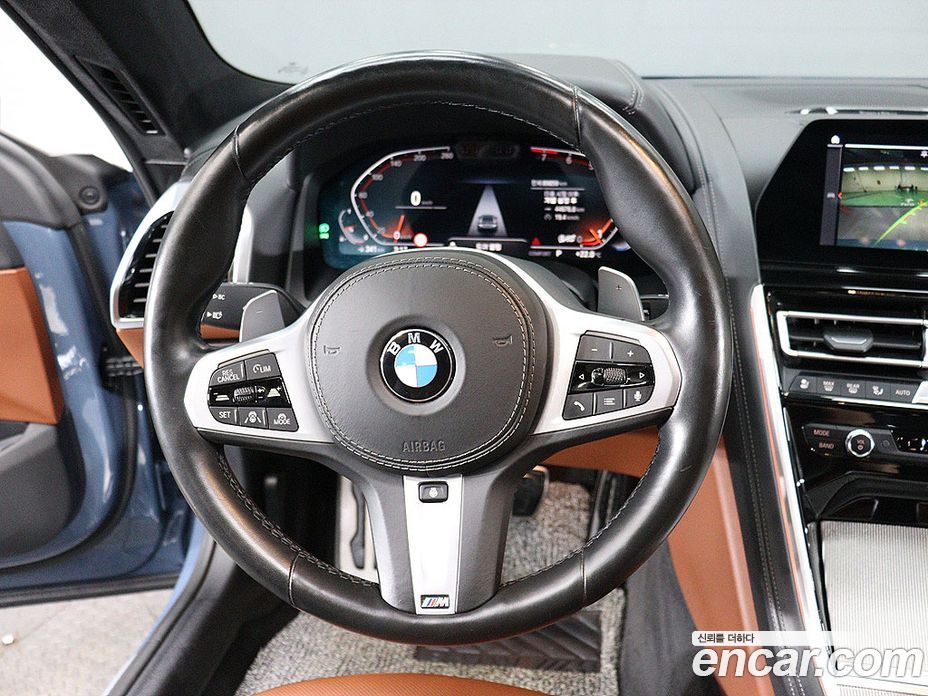 BMW 8-Series (G15) фото 12