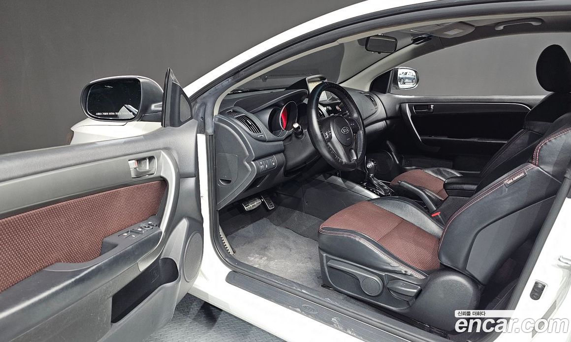 Kia Forte Koup фото 10