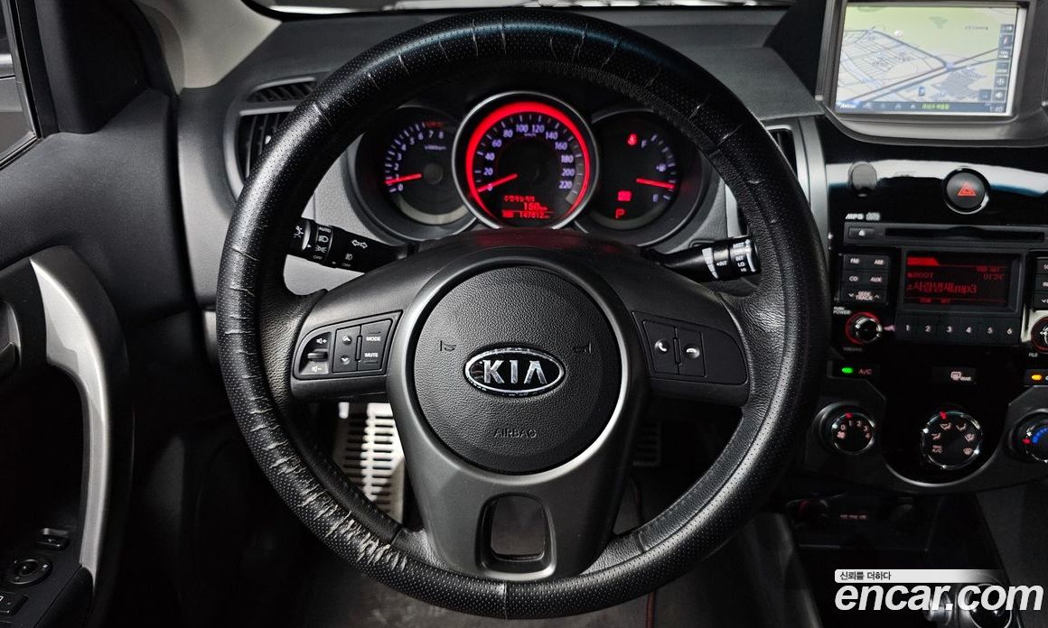 Kia Forte Koup фото 15