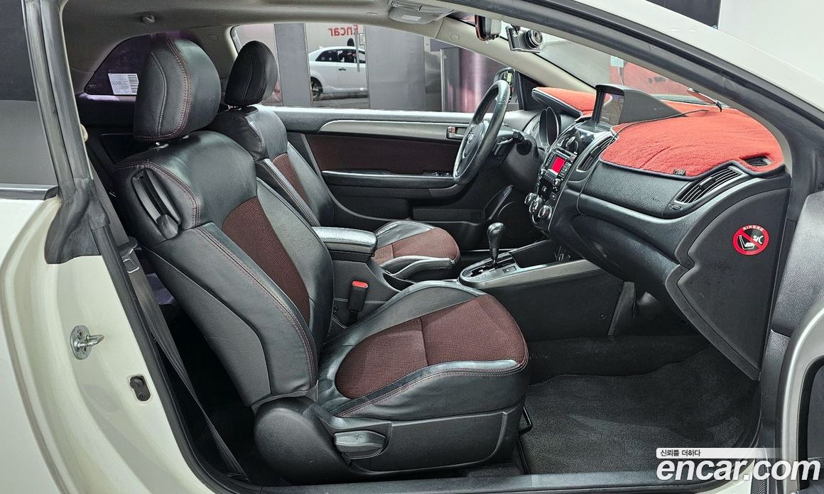 Kia Forte Koup фото 10
