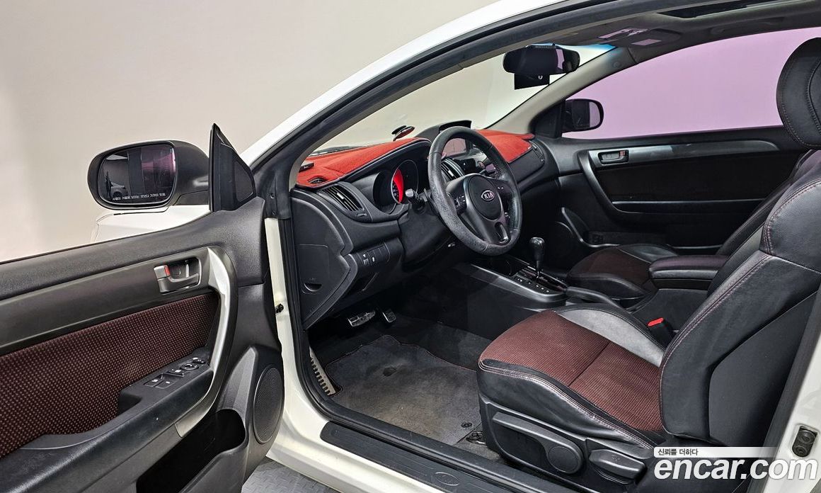 Kia Forte Koup фото 11