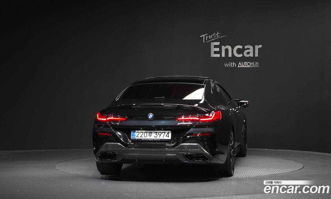 BMW 8-Series (G15) фото 4