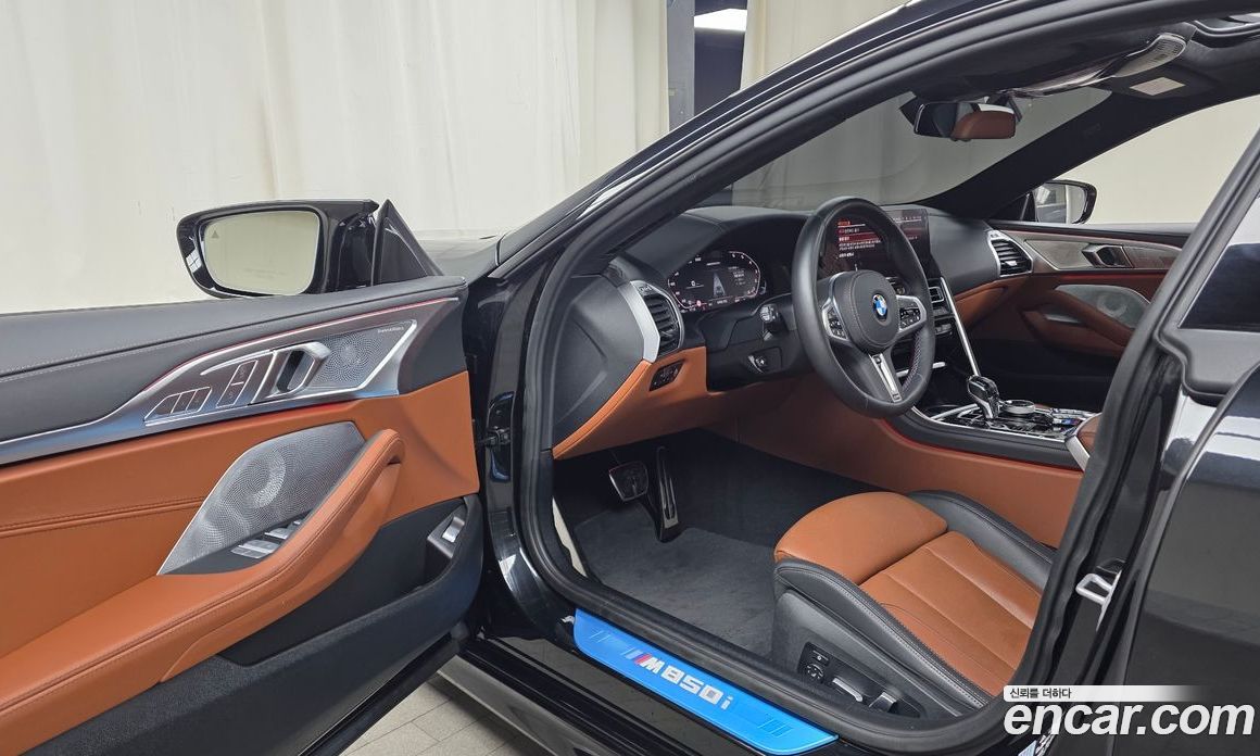 BMW 8-Series (G15) фото 10