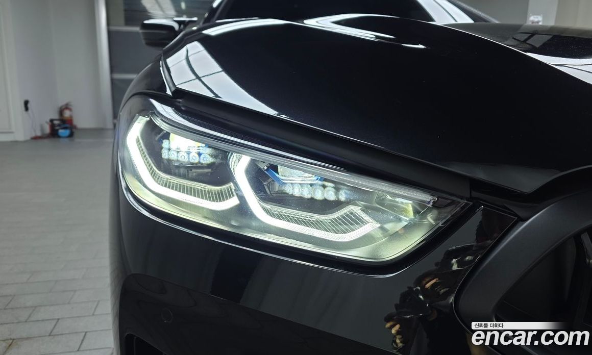 BMW 8-Series (G15) фото 23