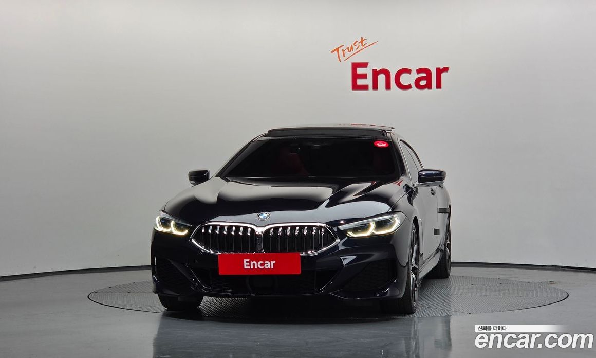 BMW 8-Series (G15) фото 3