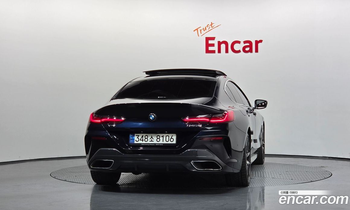 BMW 8-Series (G15) фото 4