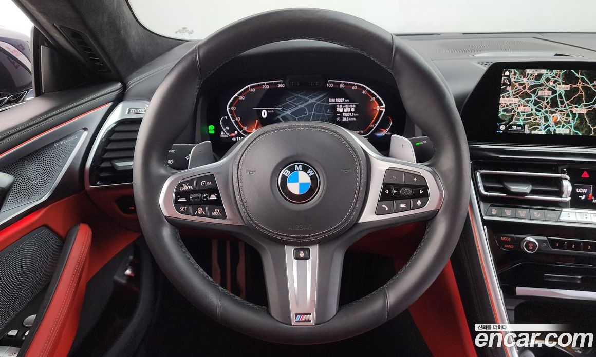 BMW 8-Series (G15) фото 12