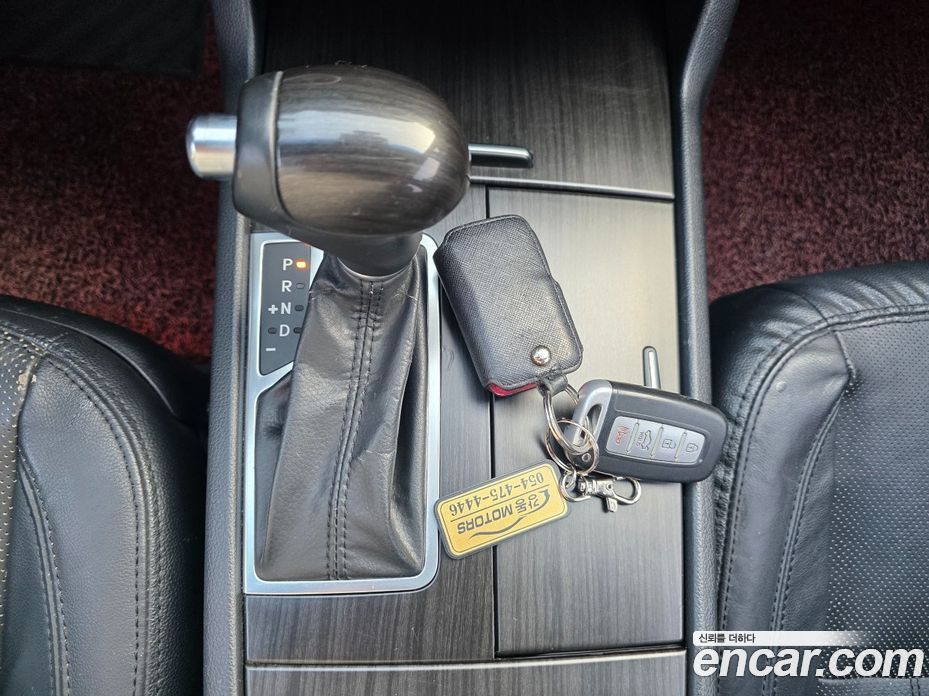 Kia K7 Prestige фото 9