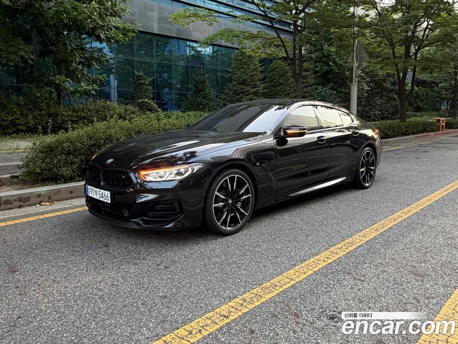 BMW 8-Series (G15) фото 2