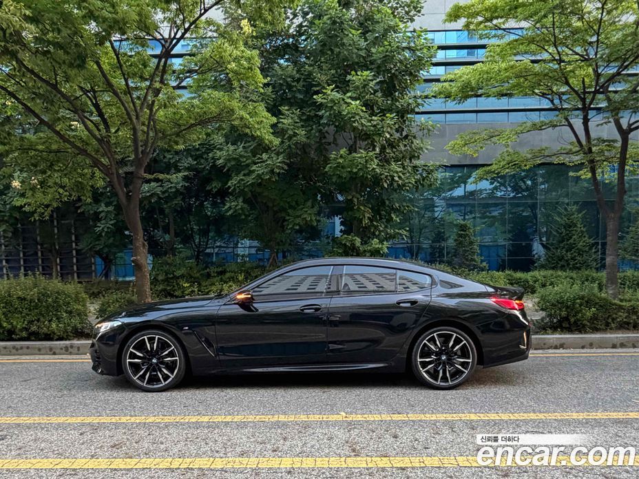 BMW 8-Series (G15) фото 3