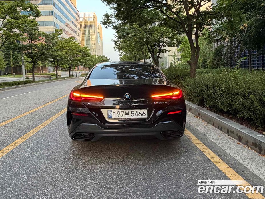 BMW 8-Series (G15) фото 6