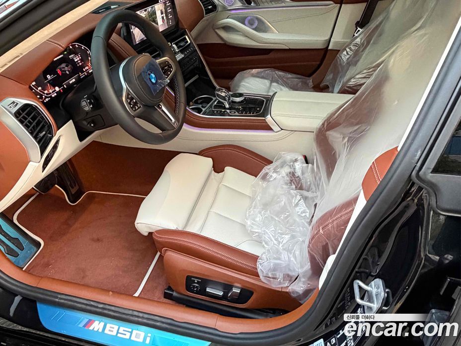 BMW 8-Series (G15) фото 7