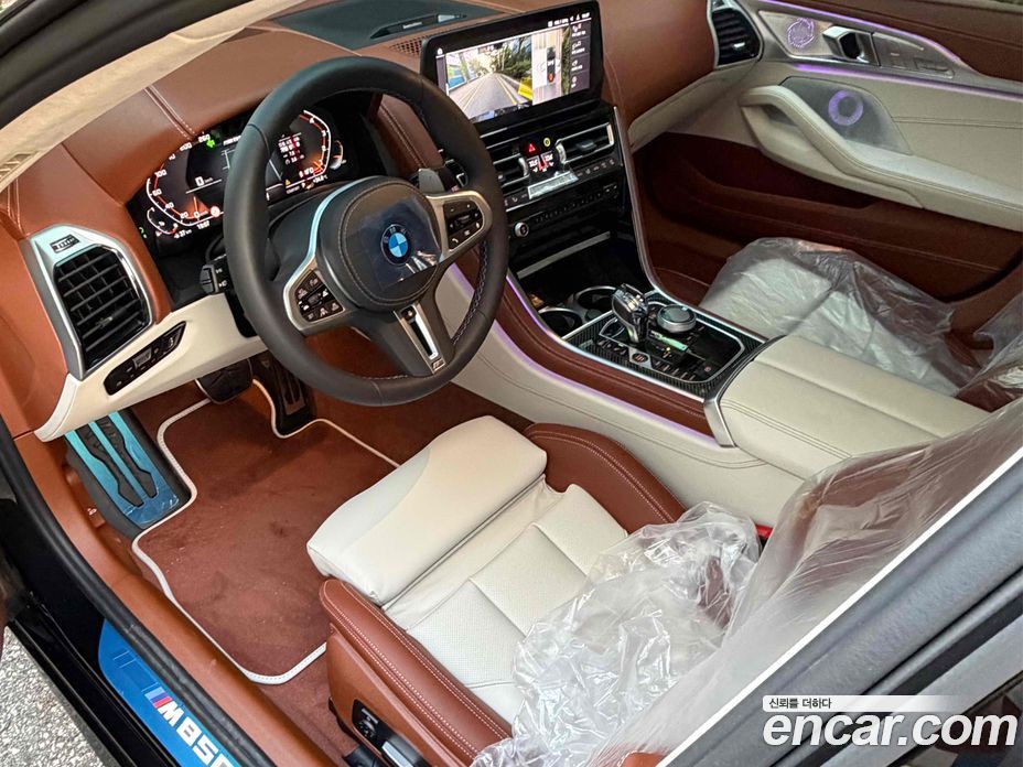 BMW 8-Series (G15) фото 8