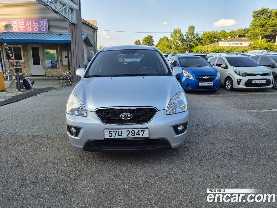 Kia Carens 2nd Gen фото 2