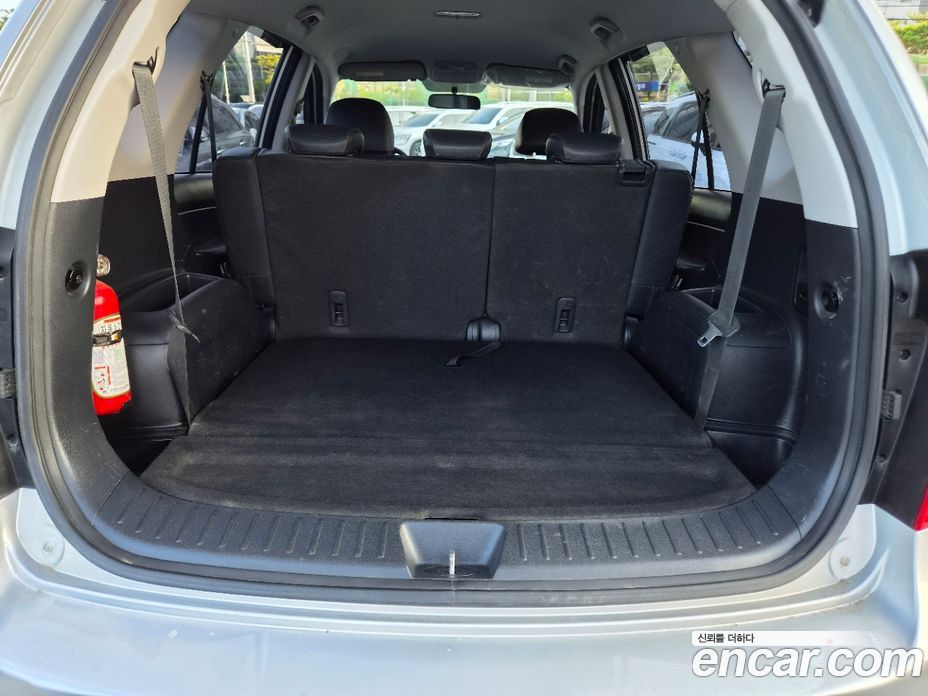 Kia Carens 2nd Gen фото 12
