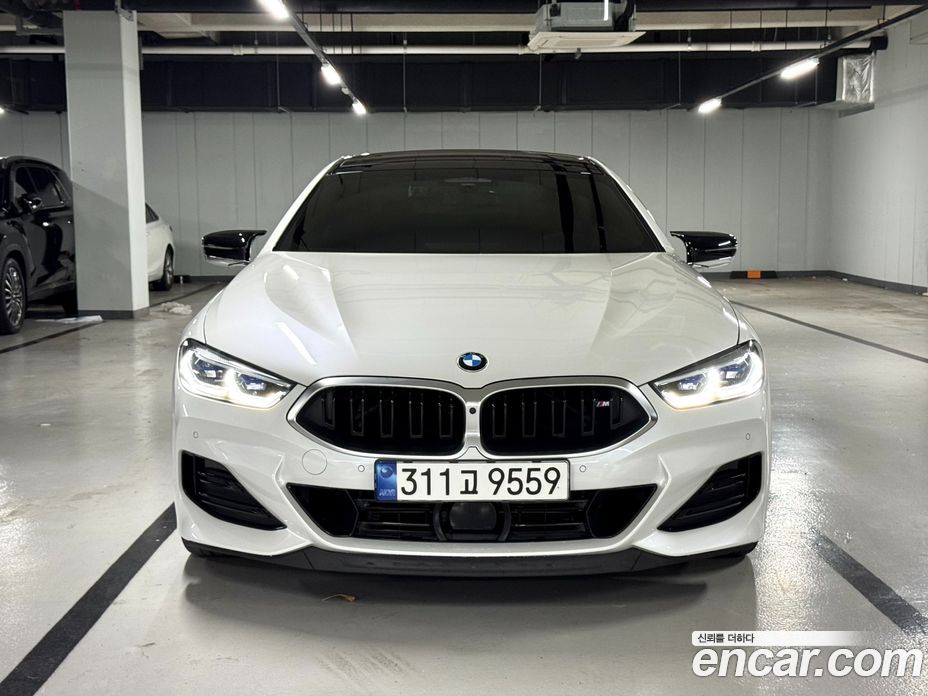 BMW 8-Series (G15) фото 3