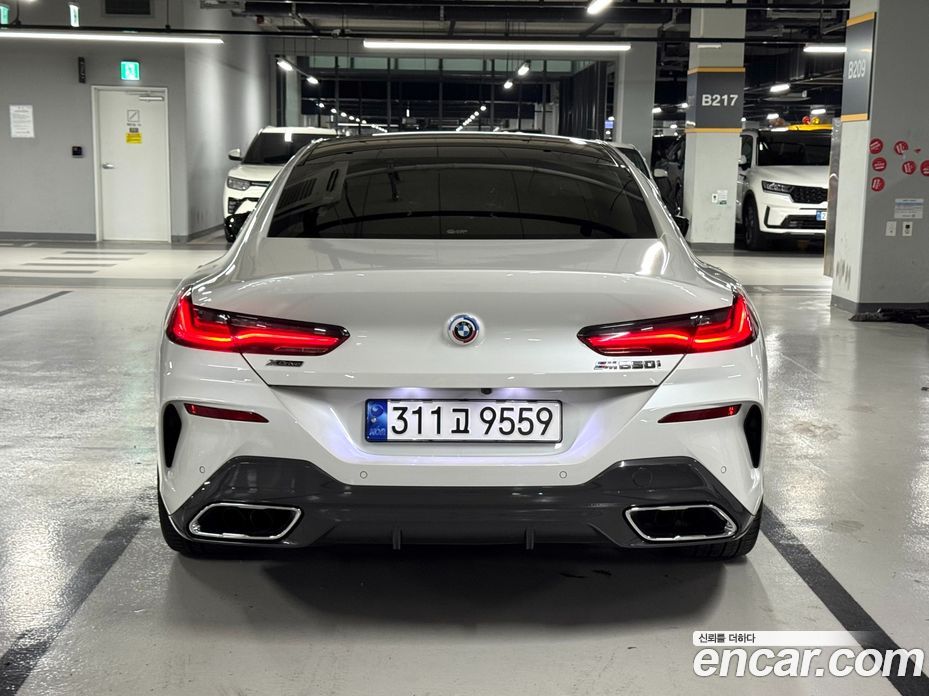 BMW 8-Series (G15) фото 4