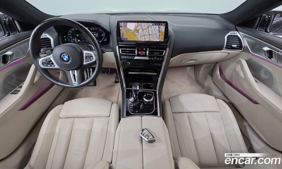 BMW 8-Series (G15) фото 7