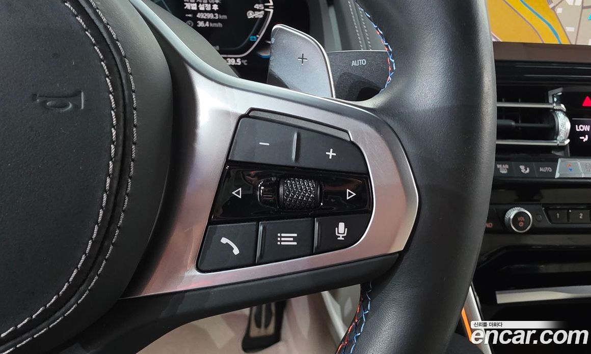 BMW 8-Series (G15) фото 33