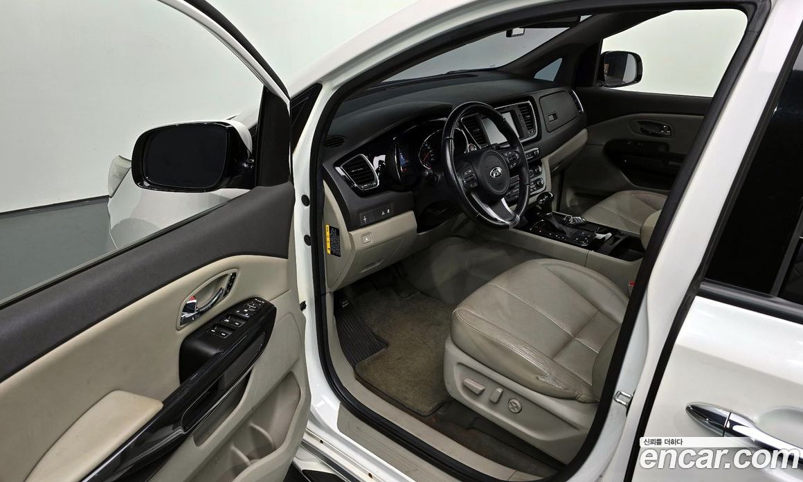 Kia Carnival 3rd Gen фото 11