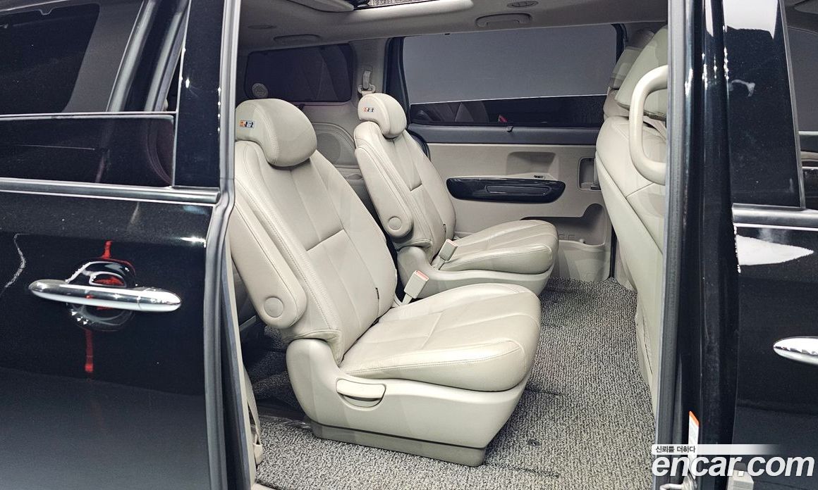 Kia Carnival 3rd Gen фото 11