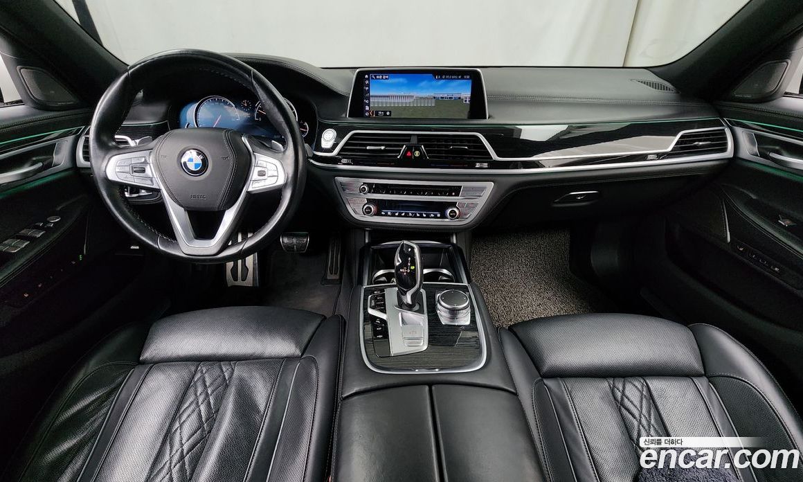 BMW 7-Series (G11) фото 7