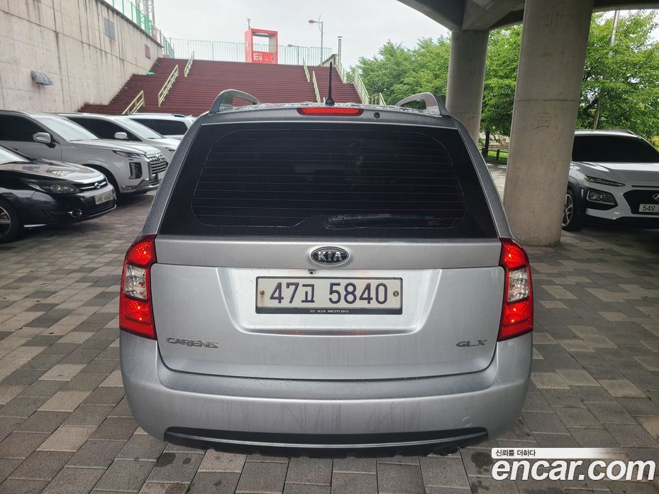 Kia Carens 2nd Gen фото 4