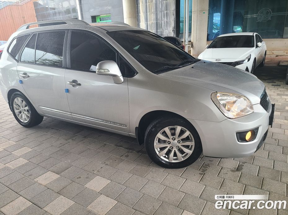Kia Carens 2nd Gen фото 6
