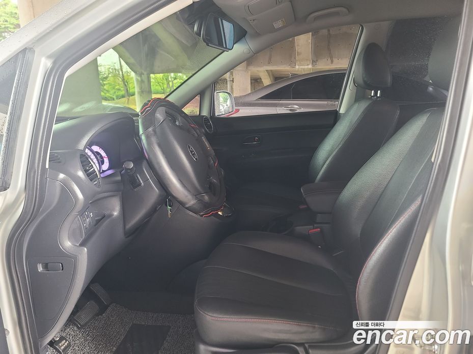 Kia Carens 2nd Gen фото 11