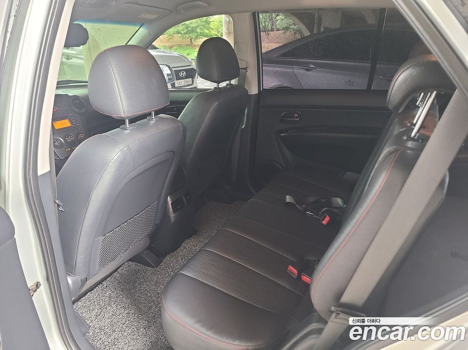 Kia Carens 2nd Gen фото 12