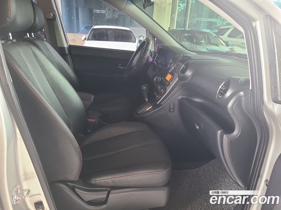 Kia Carens 2nd Gen фото 14
