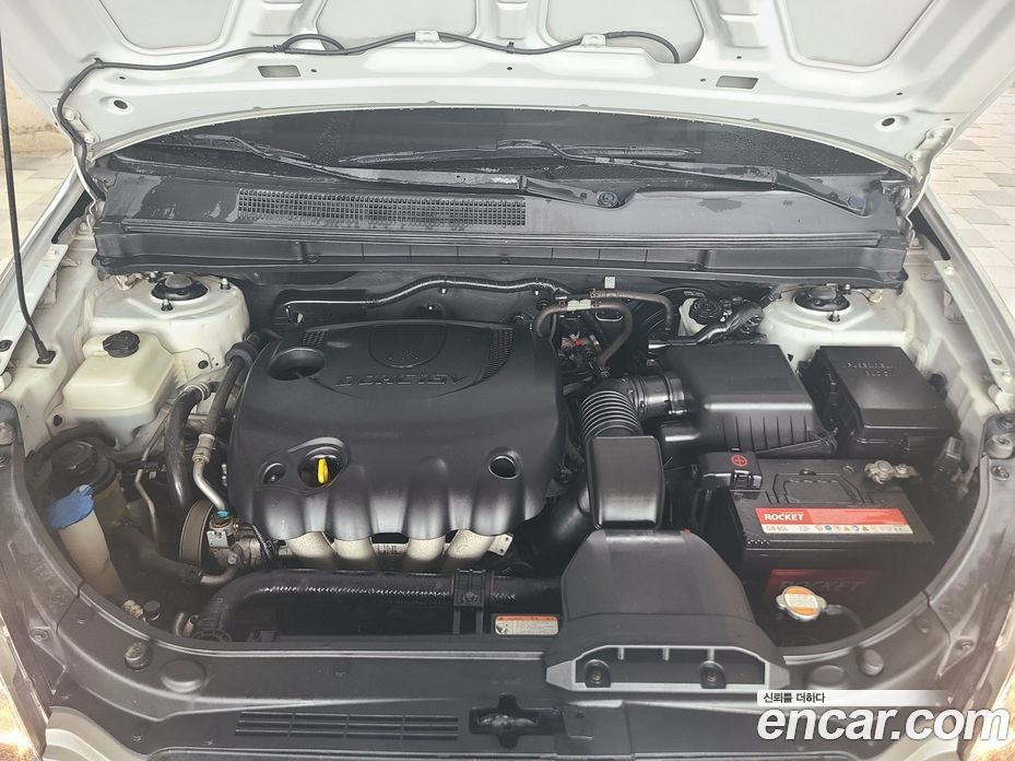 Kia Carens 2nd Gen фото 17