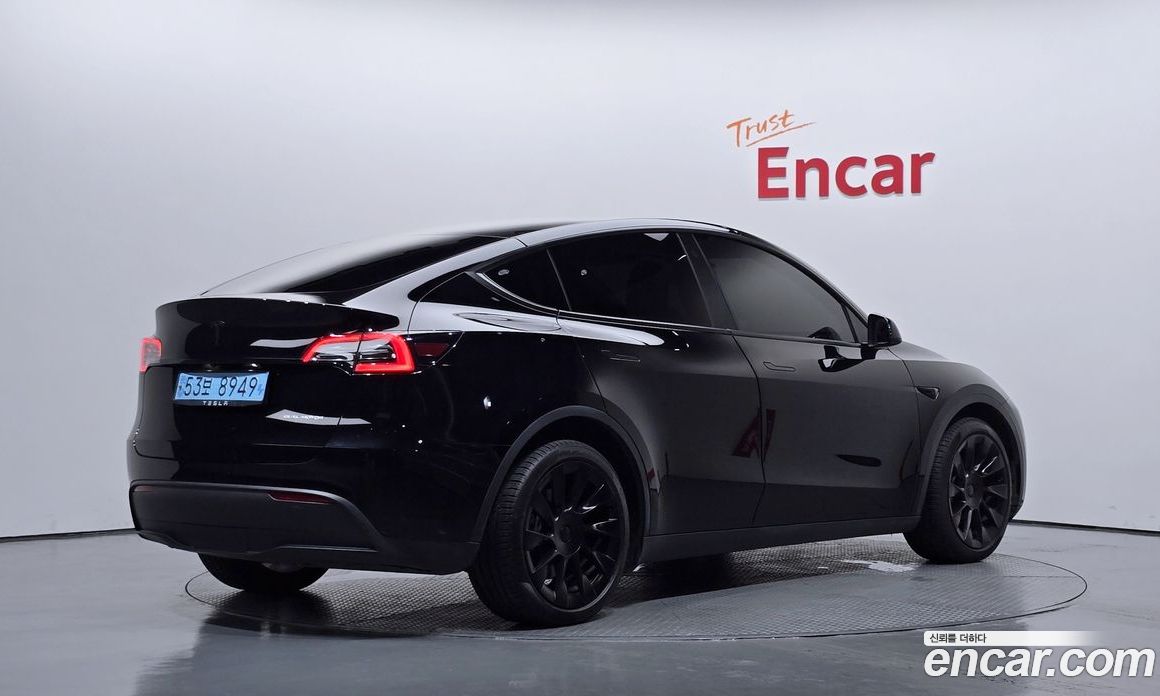 Tesla Model Y фото 2