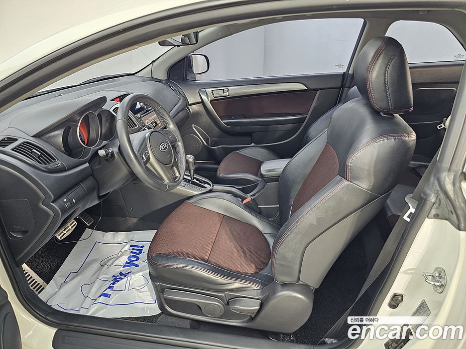 Kia Forte Koup фото 8