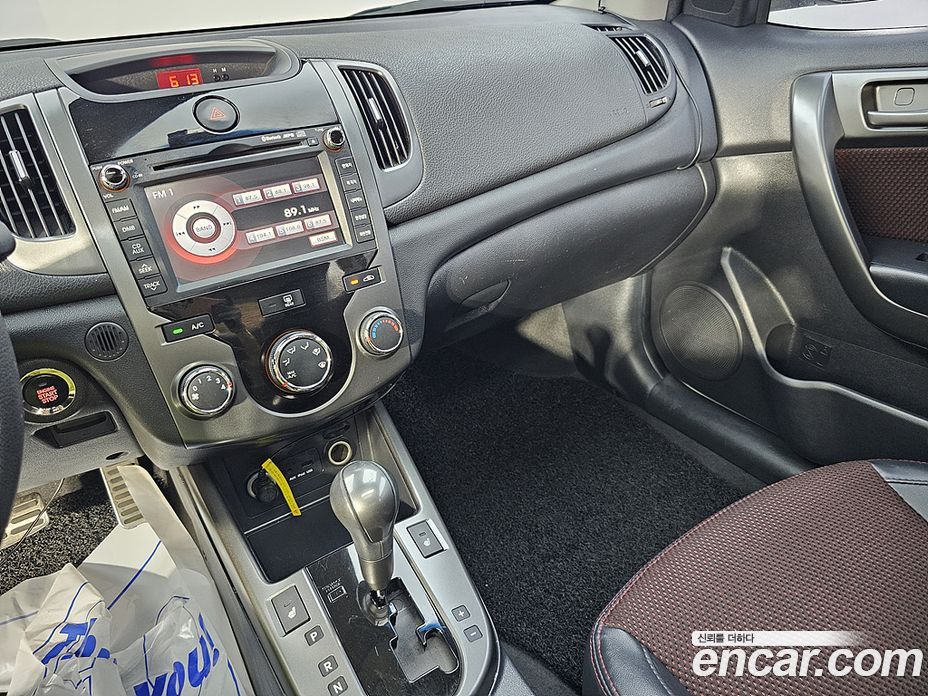 Kia Forte Koup фото 10
