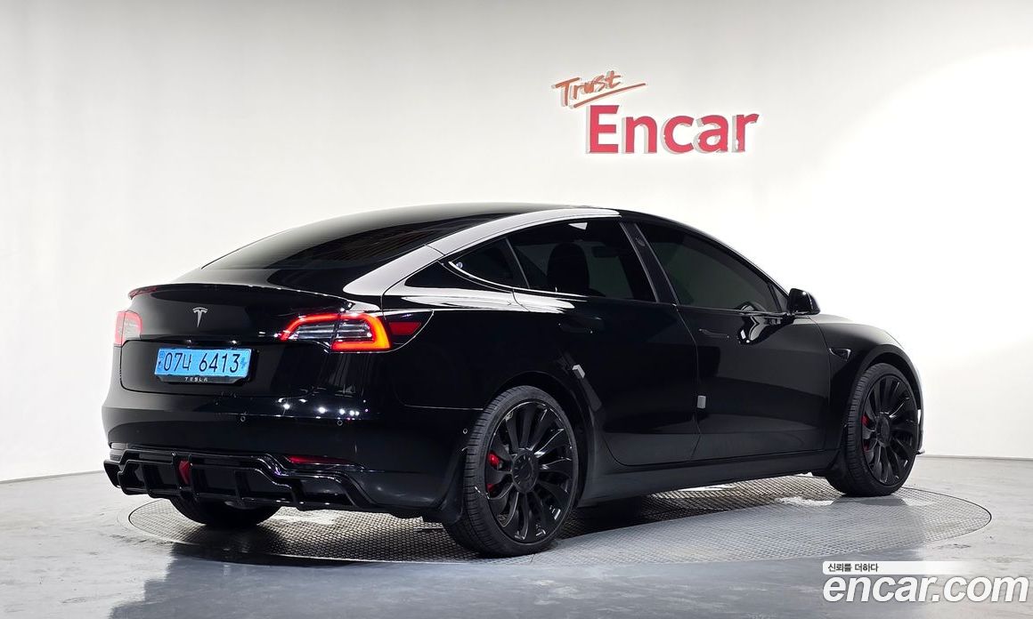 Tesla Model 3 фото 2