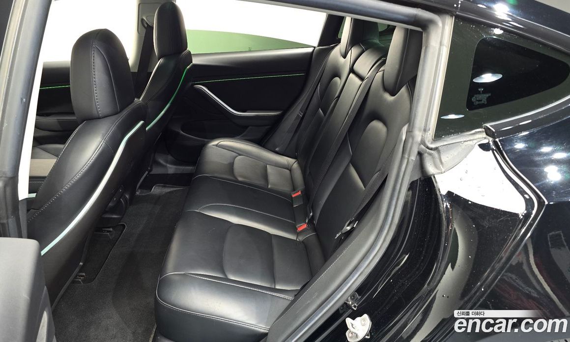 Tesla Model 3 фото 11