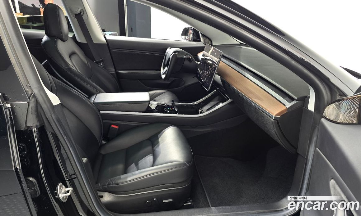 Tesla Model 3 фото 26