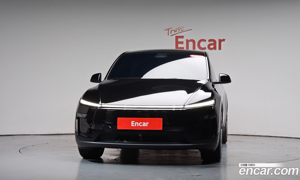 Tesla Model Y фото 2