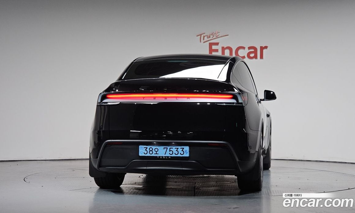 Tesla Model Y фото 3