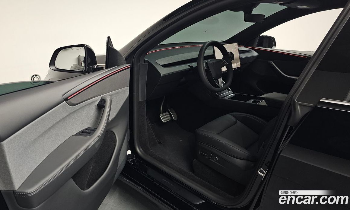 Tesla Model Y фото 9