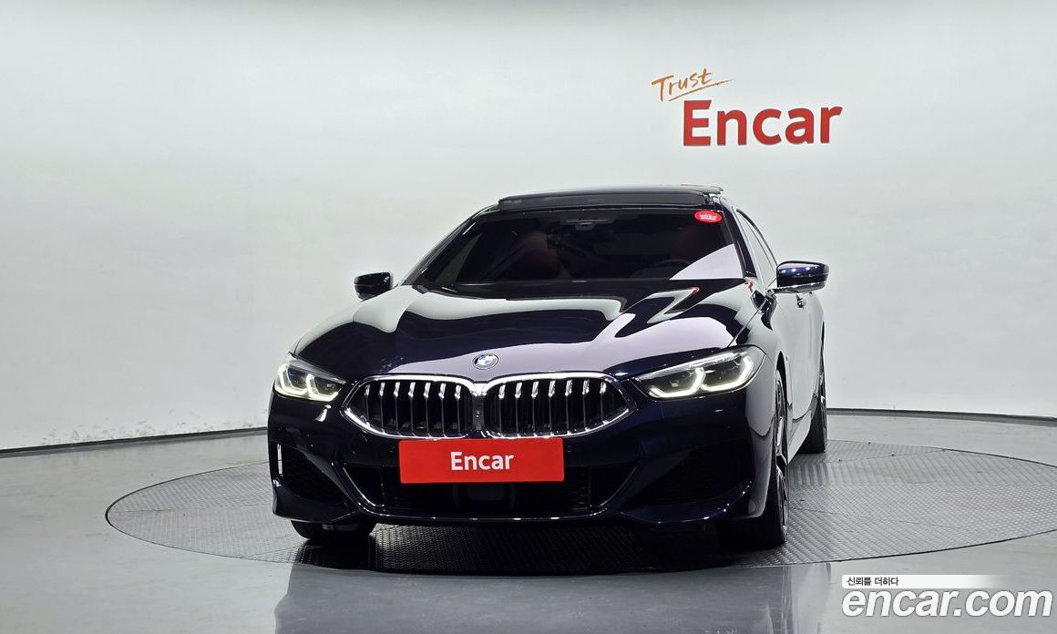 BMW 8-Series (G15) фото 3