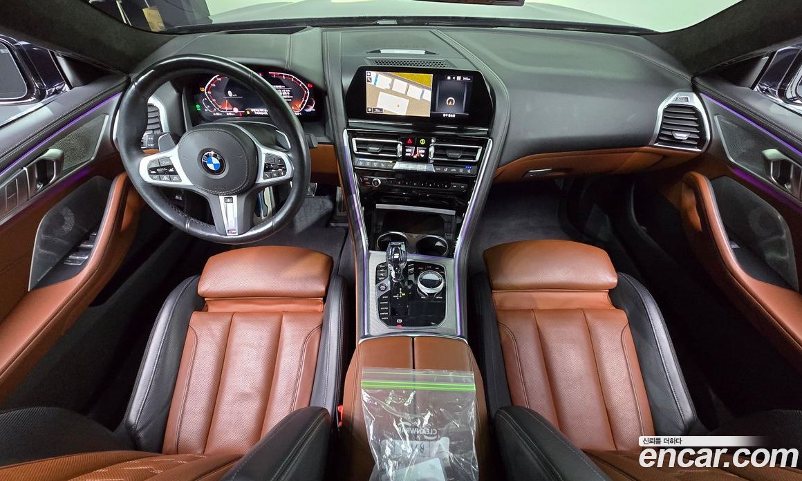 BMW 8-Series (G15) фото 7