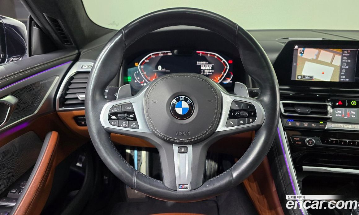 BMW 8-Series (G15) фото 13